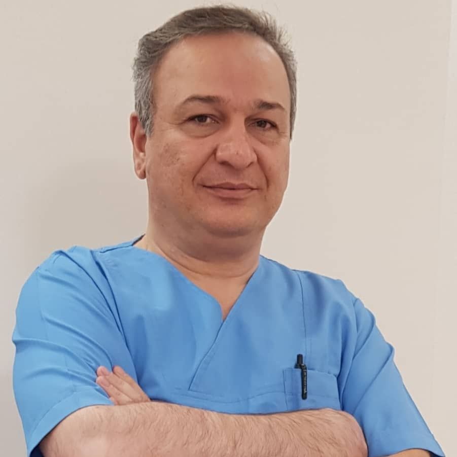 دکتر تورج مکرمی - پوست و مو تهران